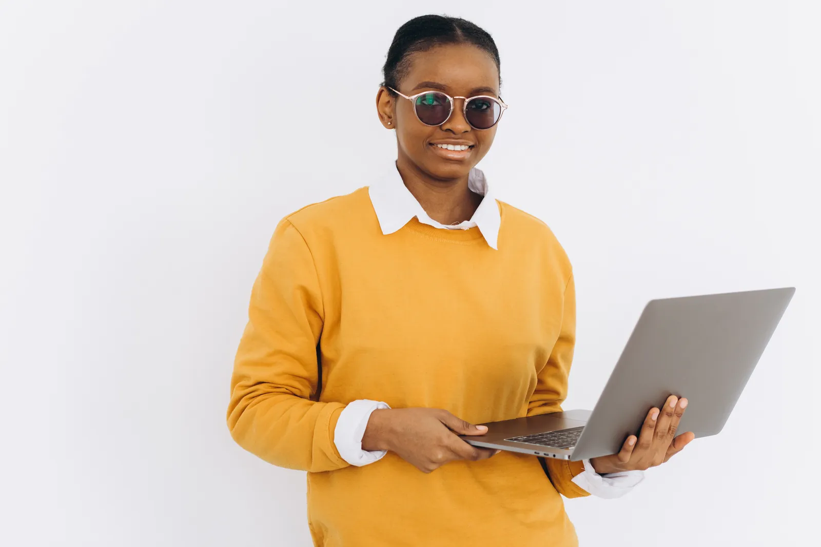 A student focused on her laptop